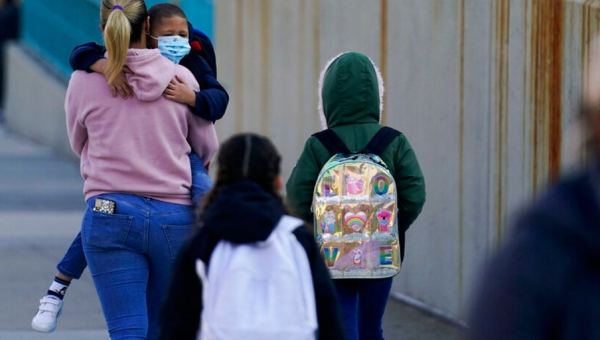 Chicago teachers vow to fight order to drop mask mandates, Puerto Rico lifts restrictions