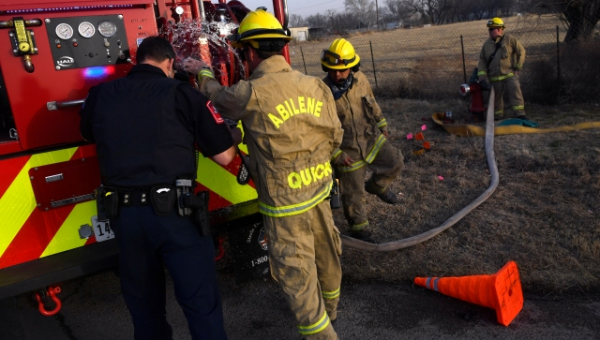 As crews battle Texas wildfires, officials brace for more