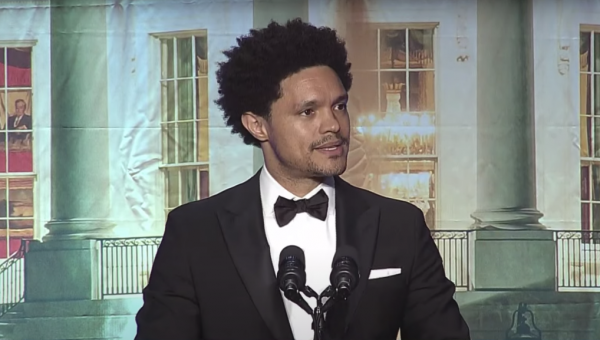 Trevor Noah’s WHCD Routine Takes Swipe At Will Smith’s Oscar Slap, Name Checks Joe Rogan, Resurrects Fox News’ Roger Ailes, & Mocks Paramount+ Programming