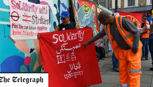 Train strike called during Labour Party Conference as union urges MPs to join picket line – live updates