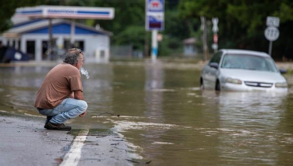 ‘Warmer and wetter’: US’ changing climate helps fuel record Kentucky flooding, experts say
