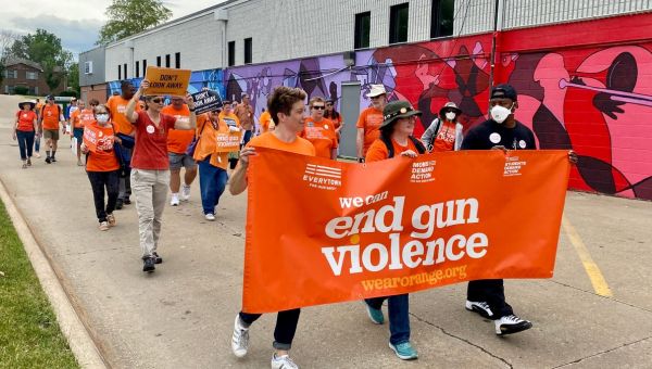 ‘It is an American issue’: Dozens march in Iowa City, urging action on gun violence after mass shootings