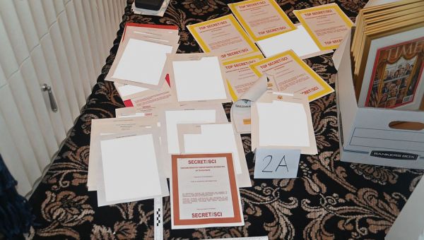 DOJ Releases Photo of Docs Seized at Mar-a-Lago, Suggests Records Were ‘Concealed and Removed’