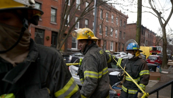 City Devastated by Deadly House Fire That Killed 13, Including 7 Children