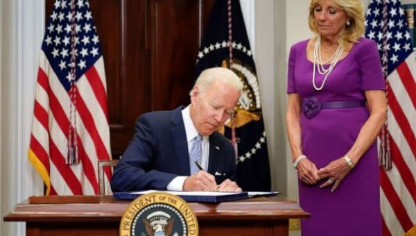 Biden signs bipartisan gun safety package into law