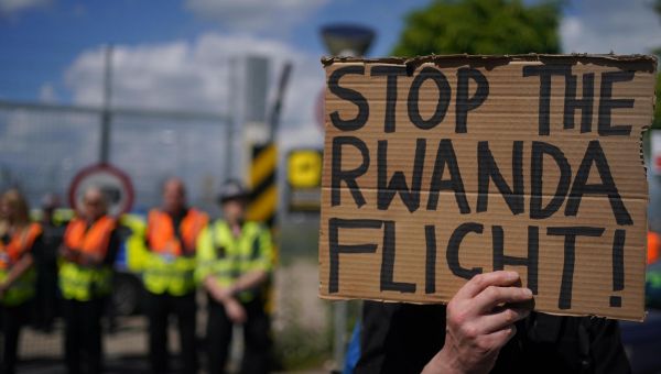 ‘No Rwanda’ – activists protest plans to deport refugees at immigration centre