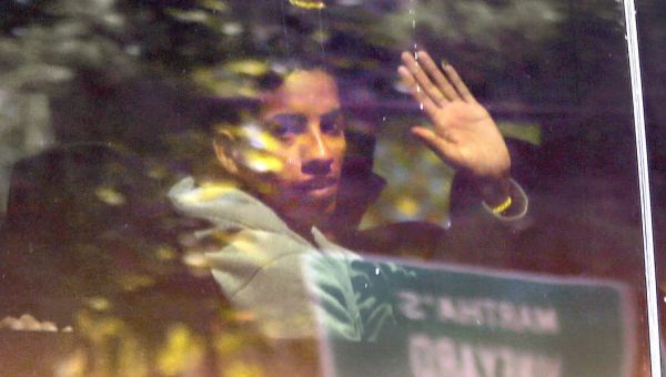 Migrants shipped to Martha’s Vineyard are staying in sparse dorms and eating at cafeteria tables at a Massachusetts military base