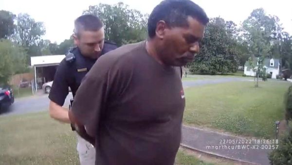 Black pastor arrested while watering neighbor’s flowers files federal lawsuit