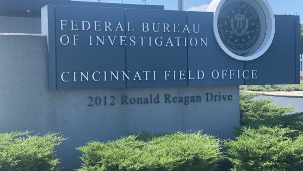 Standoff continues after man attempts to breach FBI building