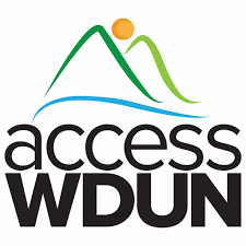 Logo for AccessWDUN featuring stylized green and blue mountain shapes with an orange circle above, and the text "access WDUN" below.