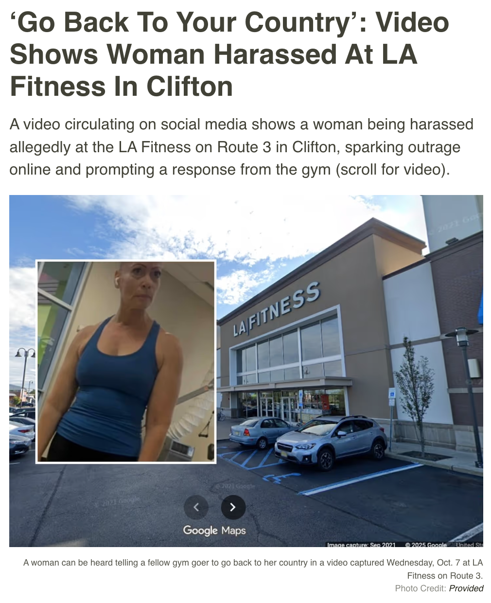A woman in a blue tank top.