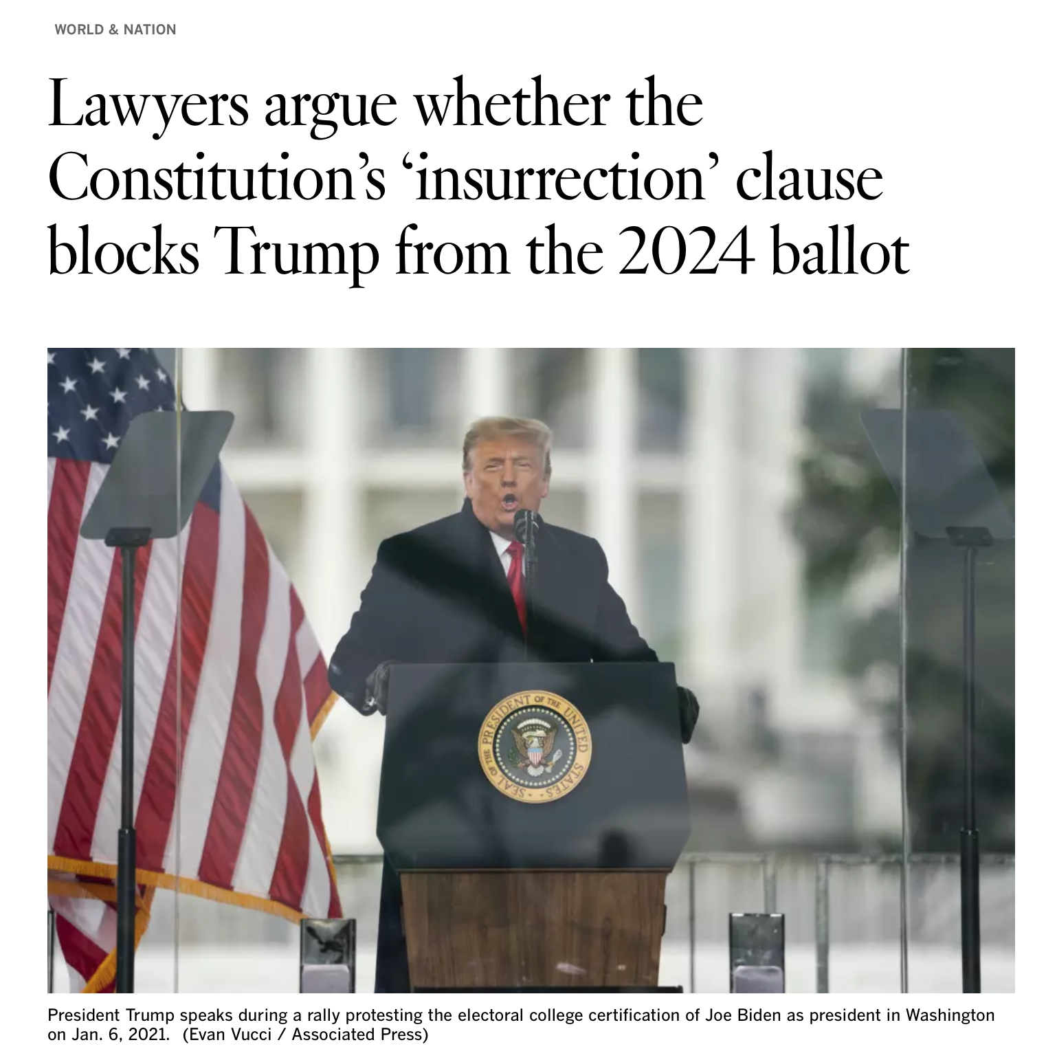 Donald Trump speaks at a podium with the presidential seal at a rally, flanked by U.S. flags, with a rainy background.