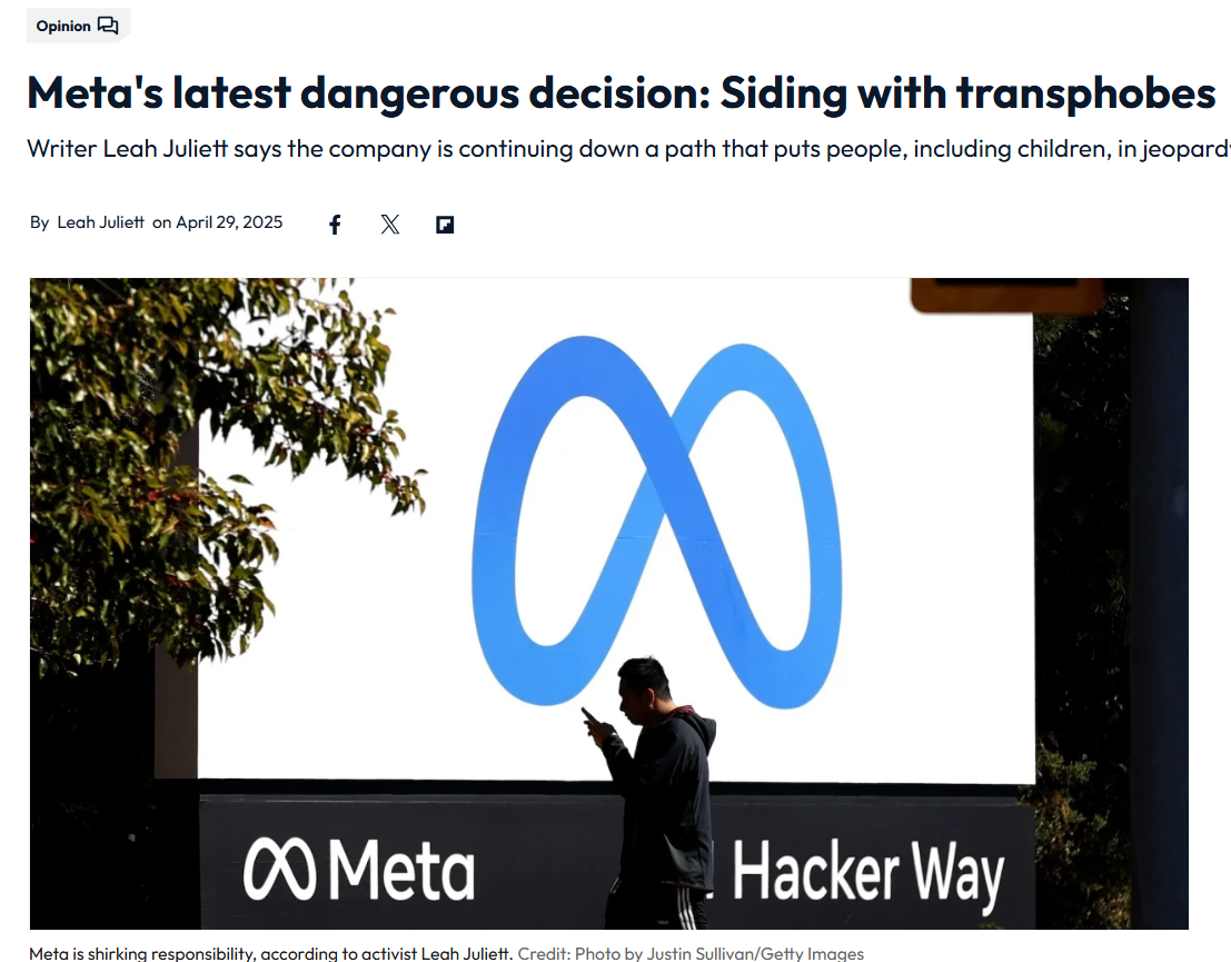 A person walks past a large Meta logo sign outside a building with "Meta" and "Hacker Way" written on it.