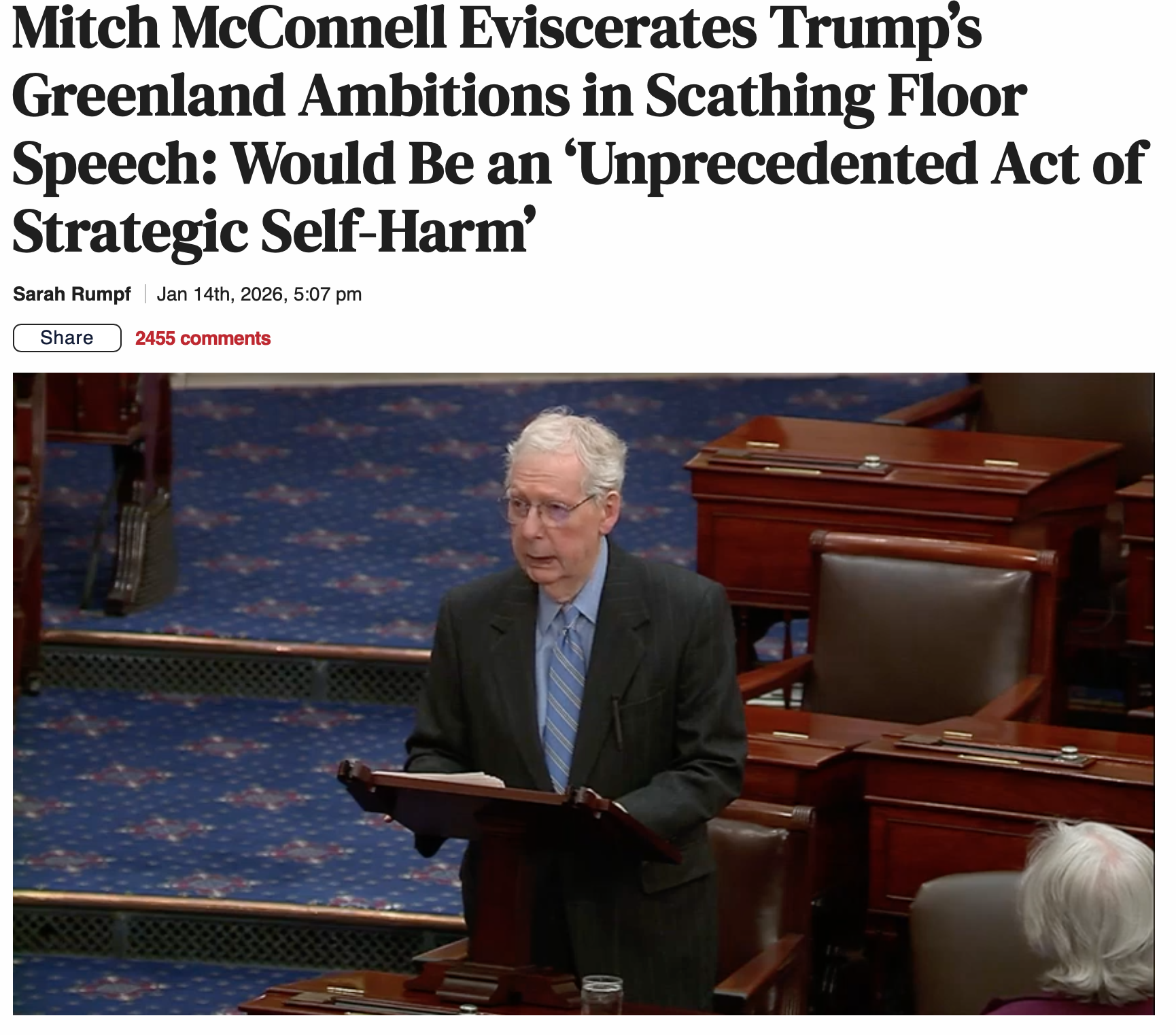 Mitch McConnell speaks at a podium on the Senate floor, with empty desks and chairs visible around him.