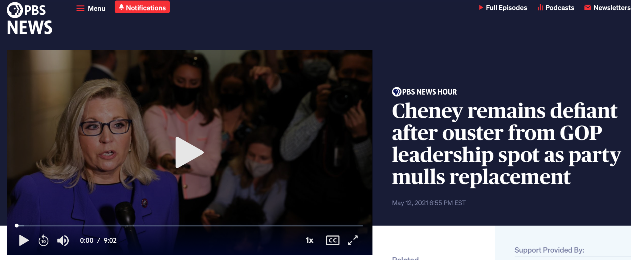 Liz Cheney speaks at a podium to reporters after being removed from her GOP leadership position, as shown in a PBS News broadcast screenshot.