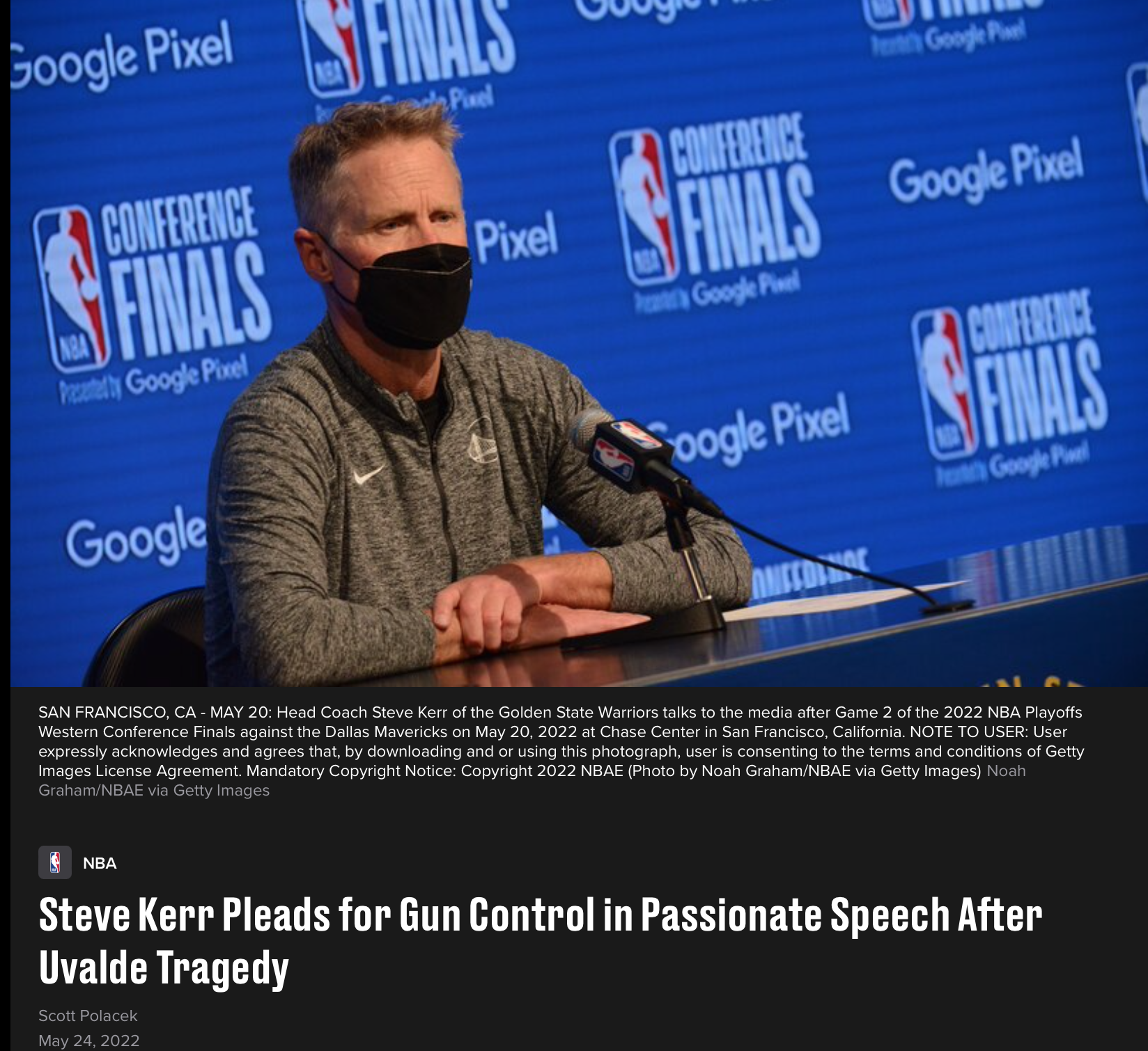 Steve Kerr, head coach of the Golden State Warriors, speaks at a press conference table before microphones, with a Conference Finals backdrop behind him.