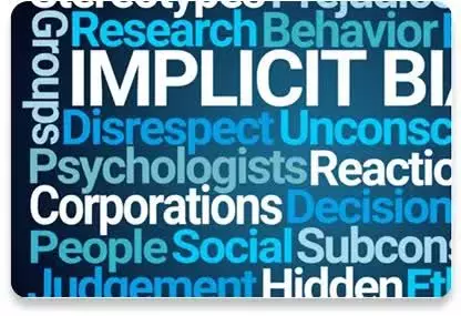 A word cloud featuring terms such as “implicit bias,” “psychologists,” “corporations,” “research,” and “hidden,” in various shades of blue on a dark background.